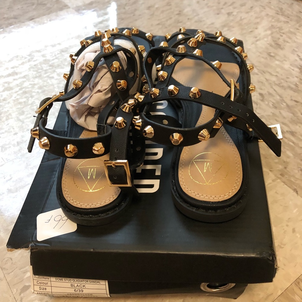 Black studded gladiator sandals